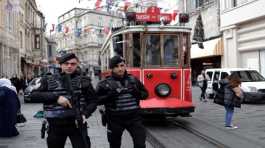 Turkish riot police patrol outside the Swedish