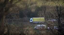 bodies of 18 migrants lie near truck