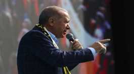 Tayyip Erdogan gives a speech during an election campaign
