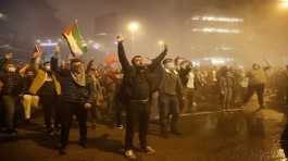 Palestinian demonstrators shout slogans
