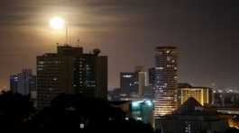 Pink Supermoon rises over the skyline of Nairobi