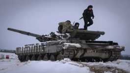 Ukraine soldiers practice on a tank